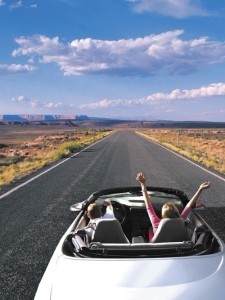 Government and automotive industry officials disagree of best way to combat distracted driving
